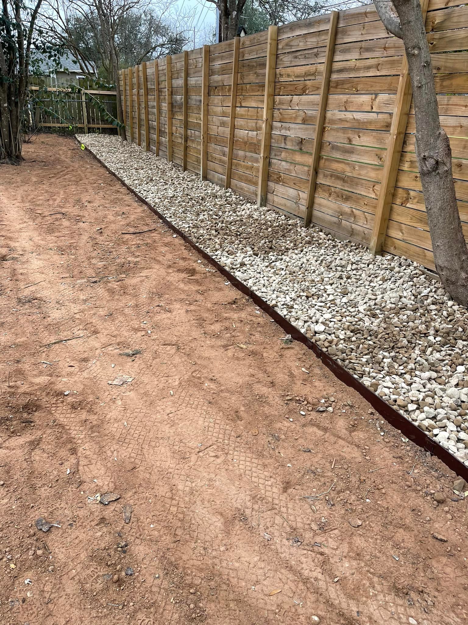Horizontal Fence & Gravel