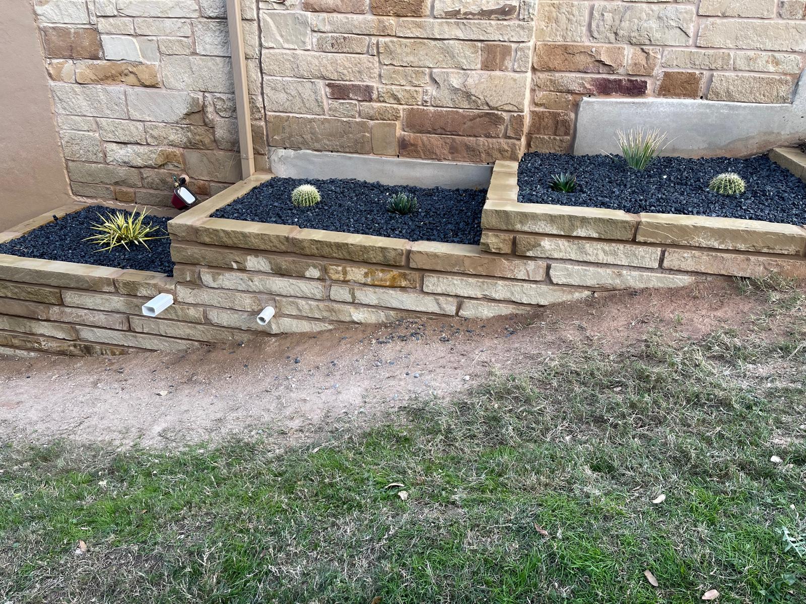 Stone Planter with Black Mulch